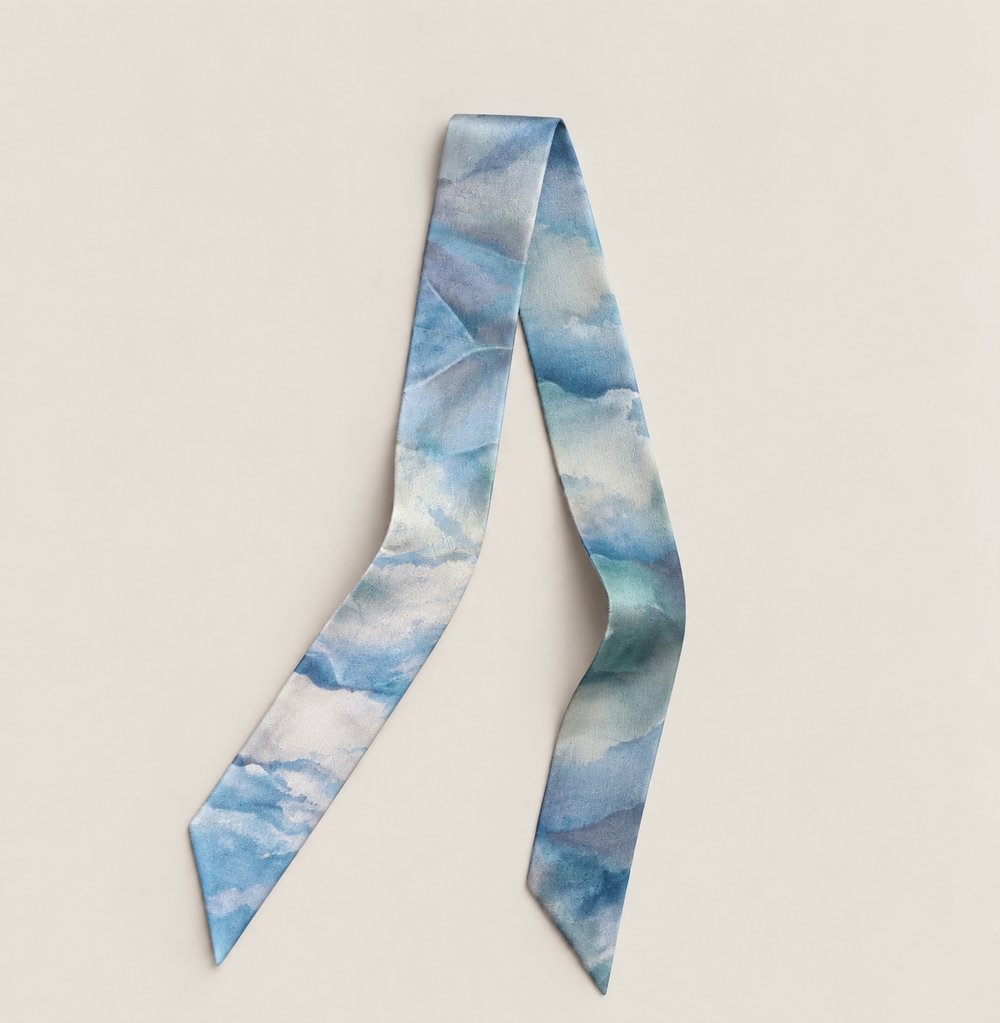 A silk twilly in sky blue and white
